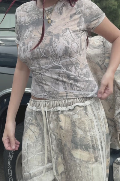 Load and play video in Gallery viewer, The Camo Baby Tee