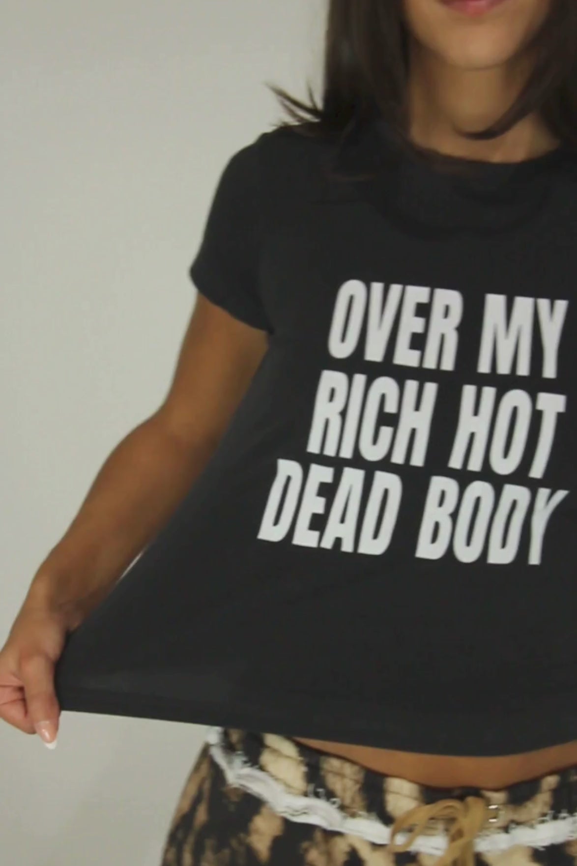Over My Rich Hot Dead Body Baby Tee in Washed Black