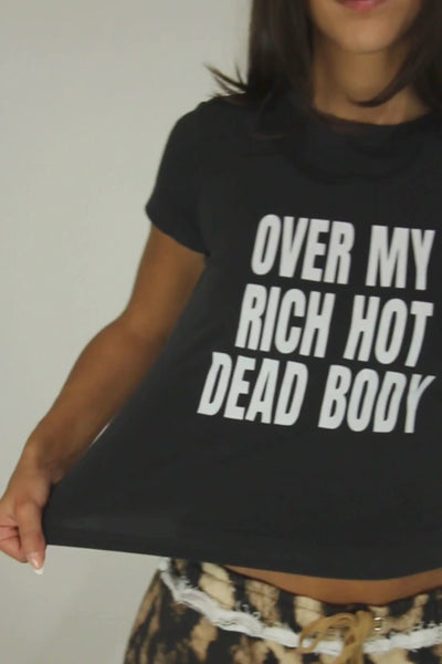 Load and play video in Gallery viewer, Over My Rich Hot Dead Body Baby Tee in Washed Black

