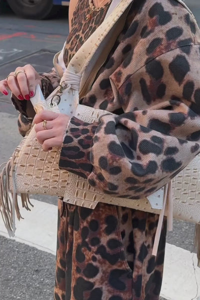 Load and play video in Gallery viewer, The Fringe Flap Bag in Crème
